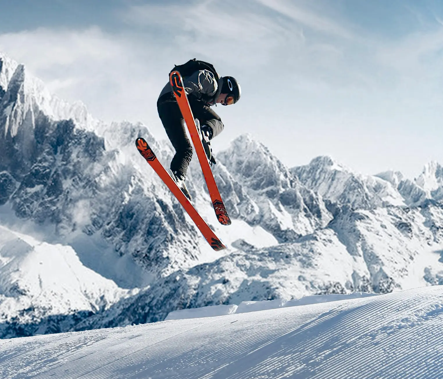 Winter sports equipment available for rent, including skis, boots, and helmets.