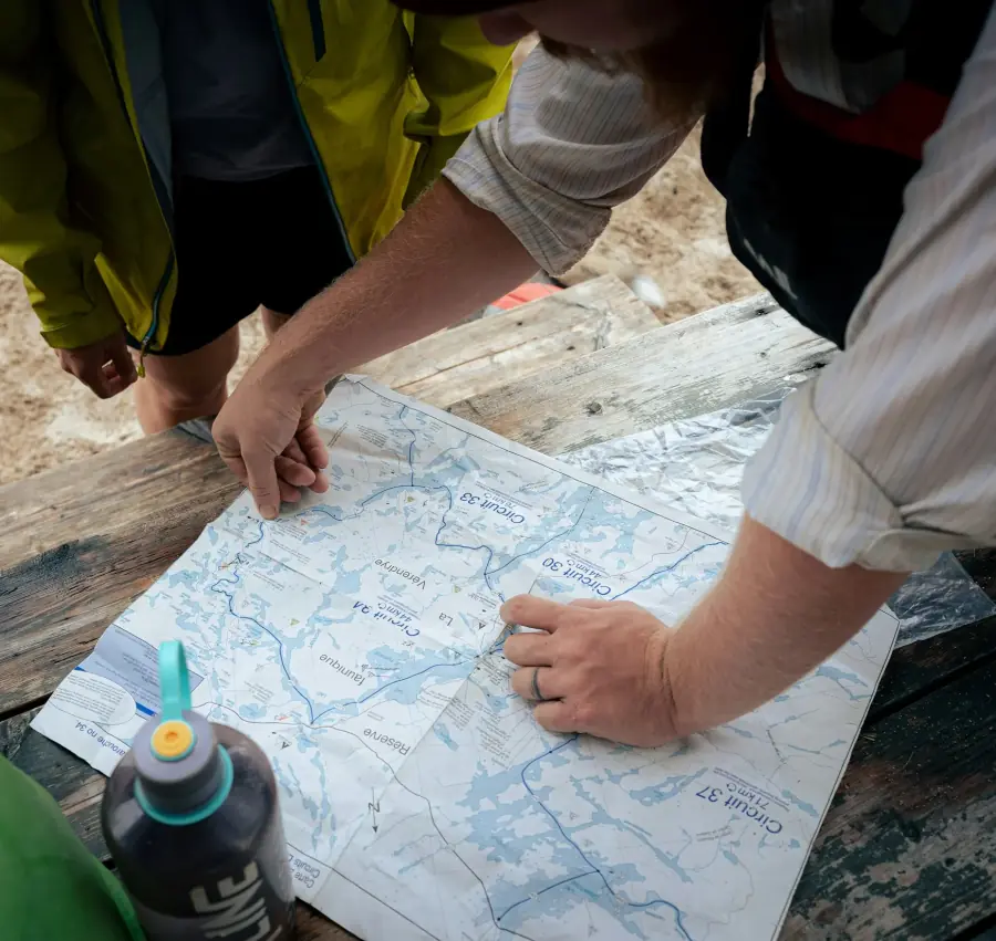 people looking at map